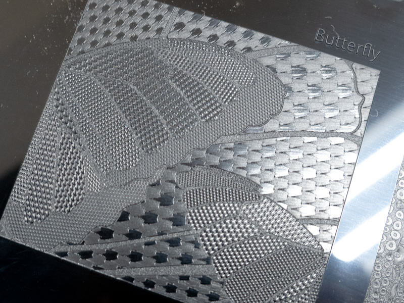 レーザー加工サンプル5種のテクスチャーが入ったサンプル 「Butterfly」蝶の鱗粉がモチーフ。最大高さ0.15mm